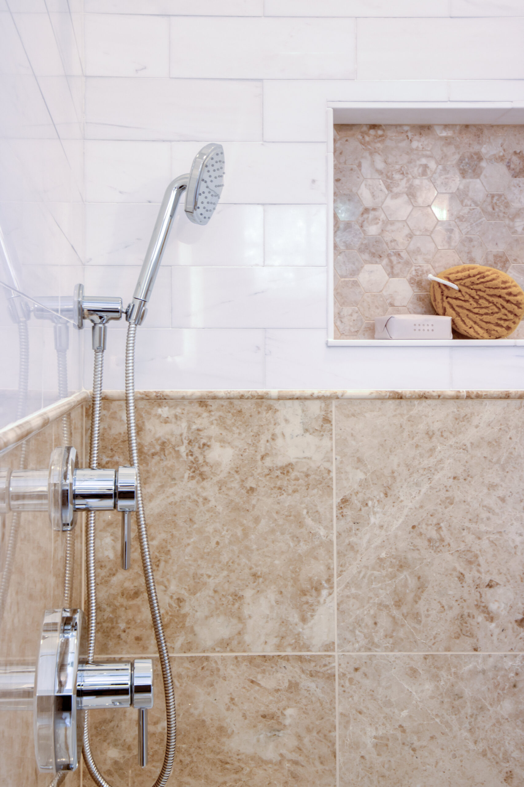 Warm Transitional Bath with Natural Stone Character